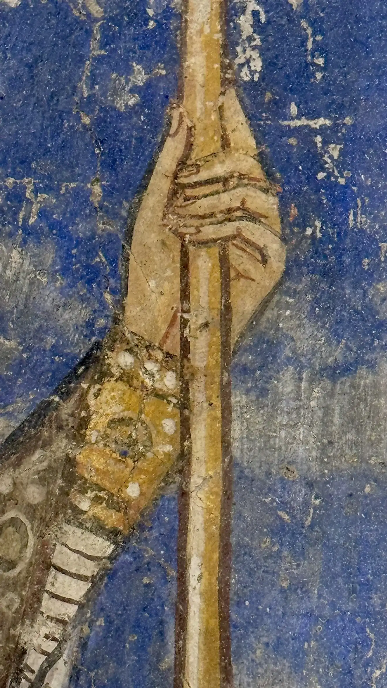 St. Romanus, holding a staff in his left hand.