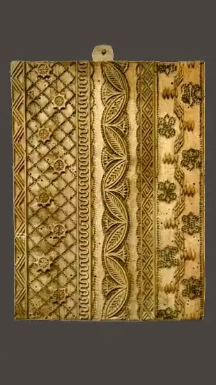 Wooden textile printing mould with linear ornamental patterns