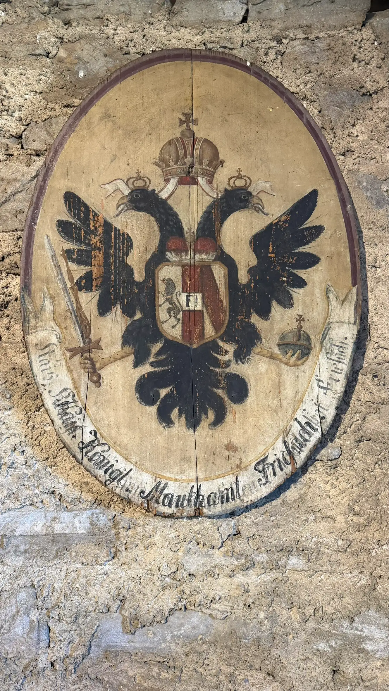 The complete Imperial-Royal toll sign is displayed on the museum wall.